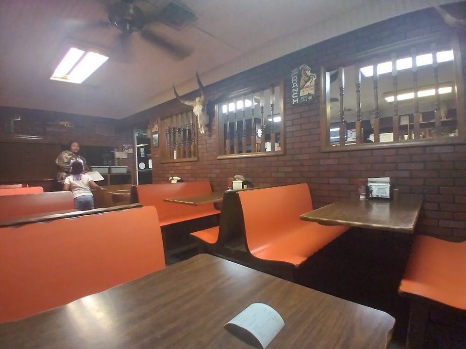 Counter area in a cozy local grill.