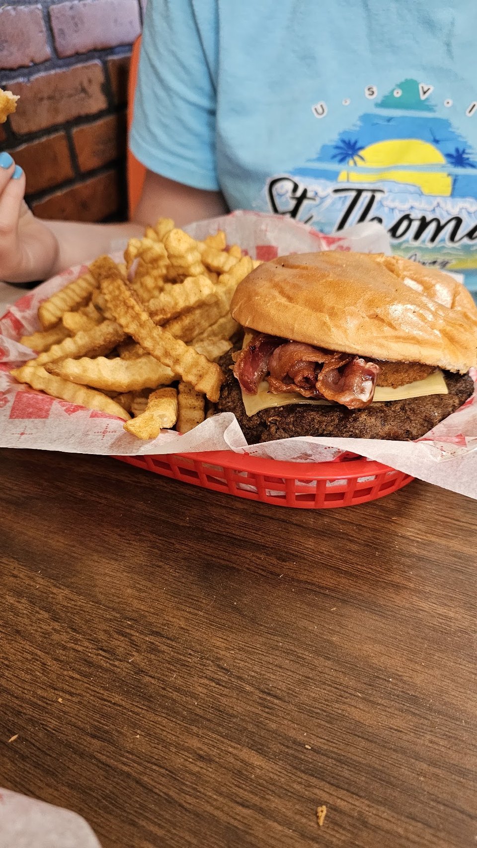 Burger menu with fries and onion rings.